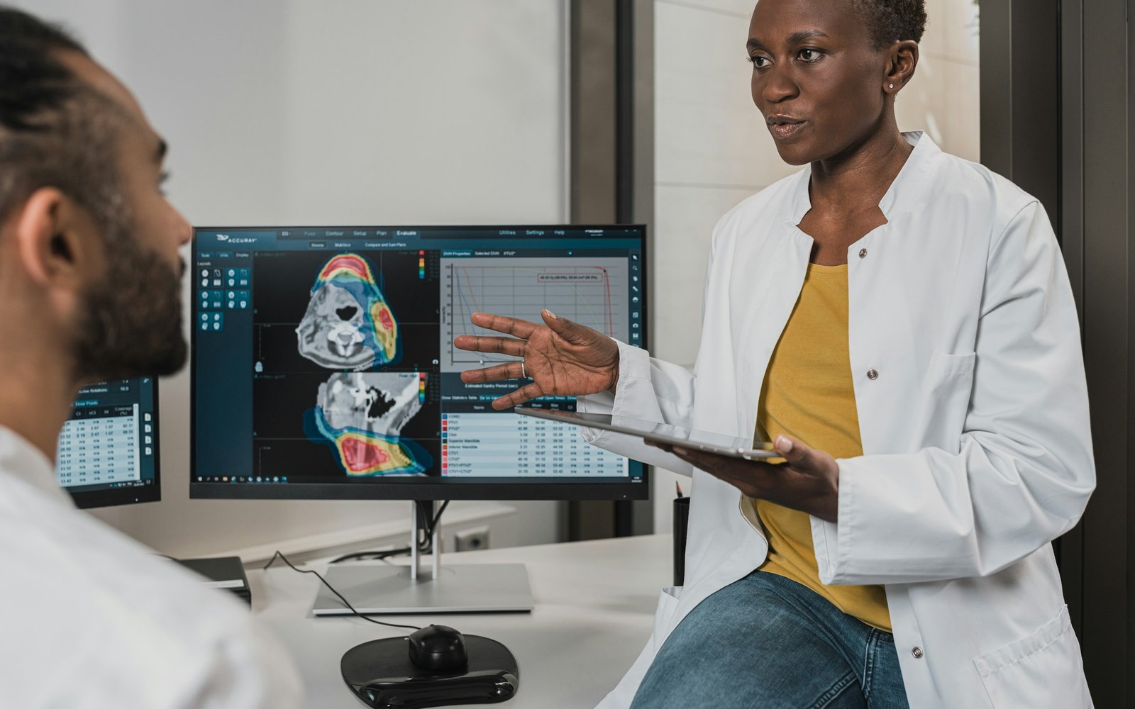 Healthcare clinicians reviewing medical imaging together